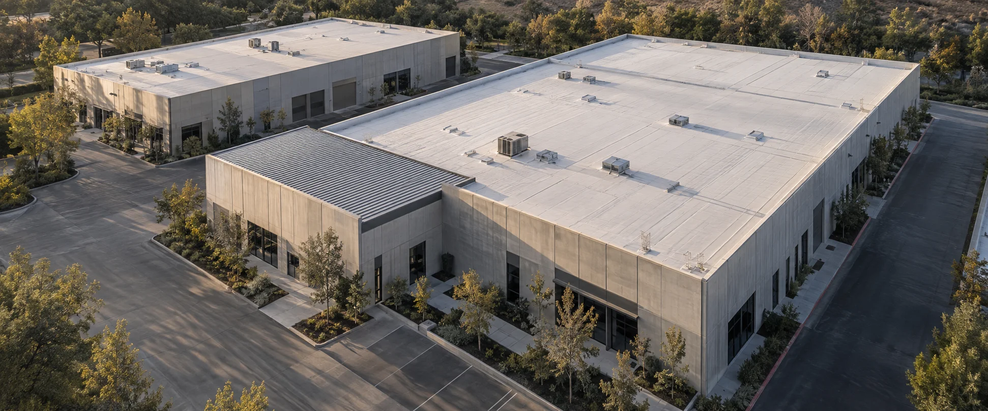 Architectural visualization of commercial buildings with membrane and standing-seam metal roofs
